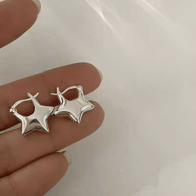 Astrielle - Orecchini a forma di stella in zirconia con dettaglio a croce