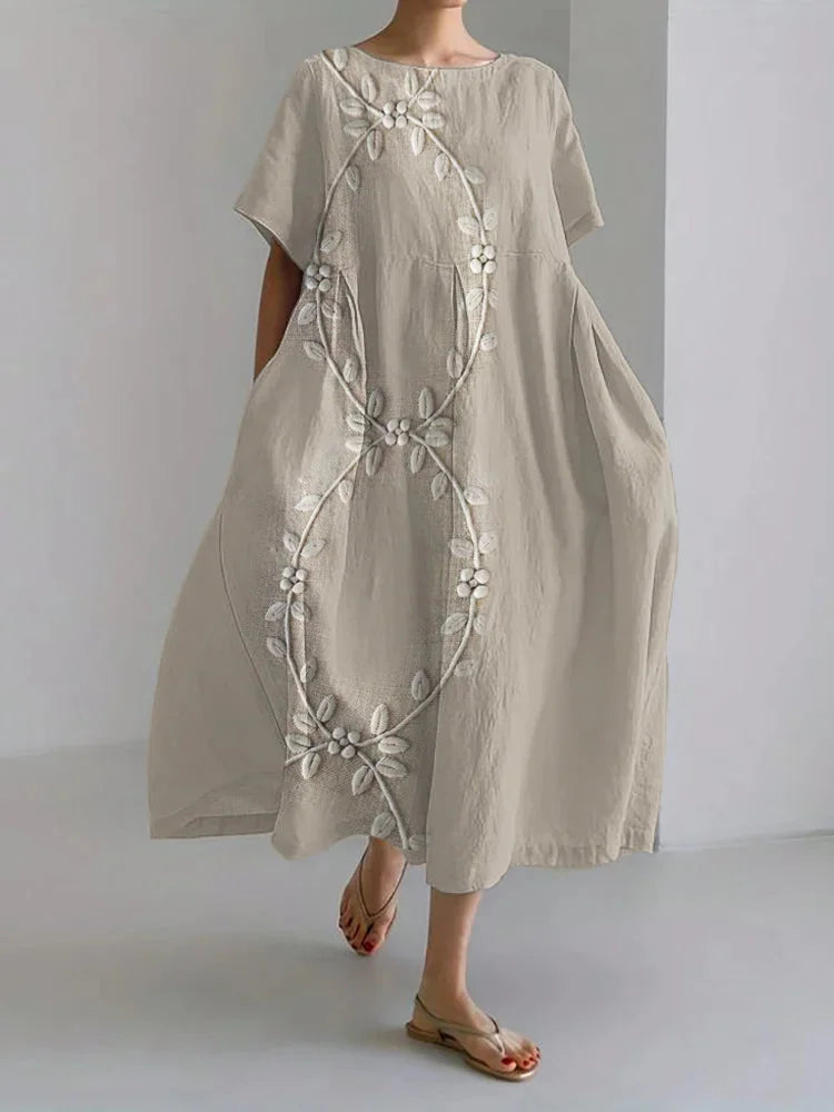 Elegant long dress made of linen blend with grapevine embroidery