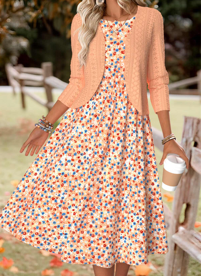 Orange dress with floral print and long sleeves and cardigan