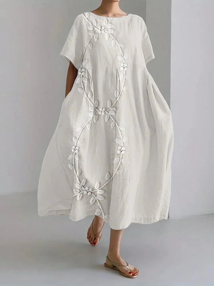 Elegant long dress made of linen blend with grapevine embroidery
