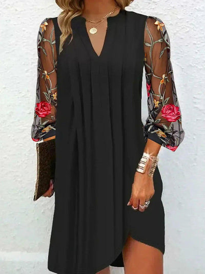Renée | Elegant mini dress with V-neck and transparent sleeves